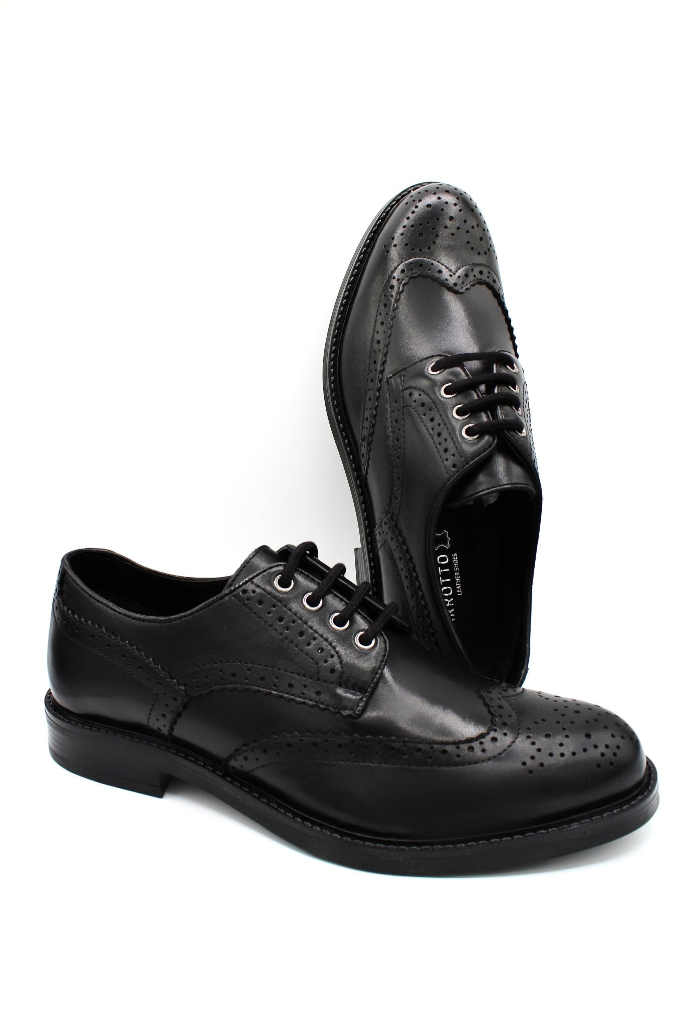 Stringate in pelle - Lavorazione Brogue